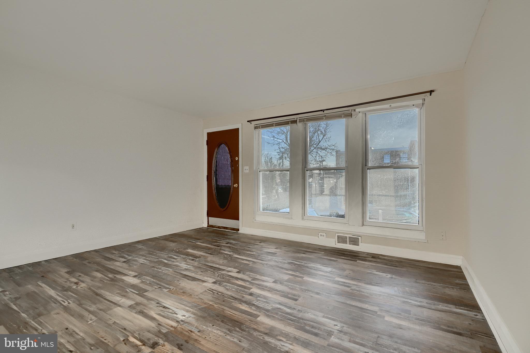 1259 Haverhill Road Baltimore, MD 21229 - Photo 7 of 40 Living Room with LVP Floors