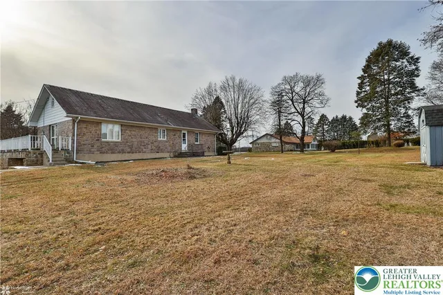 a view of a city with mountains in the background