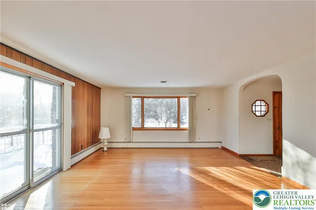 a view of an empty room and window