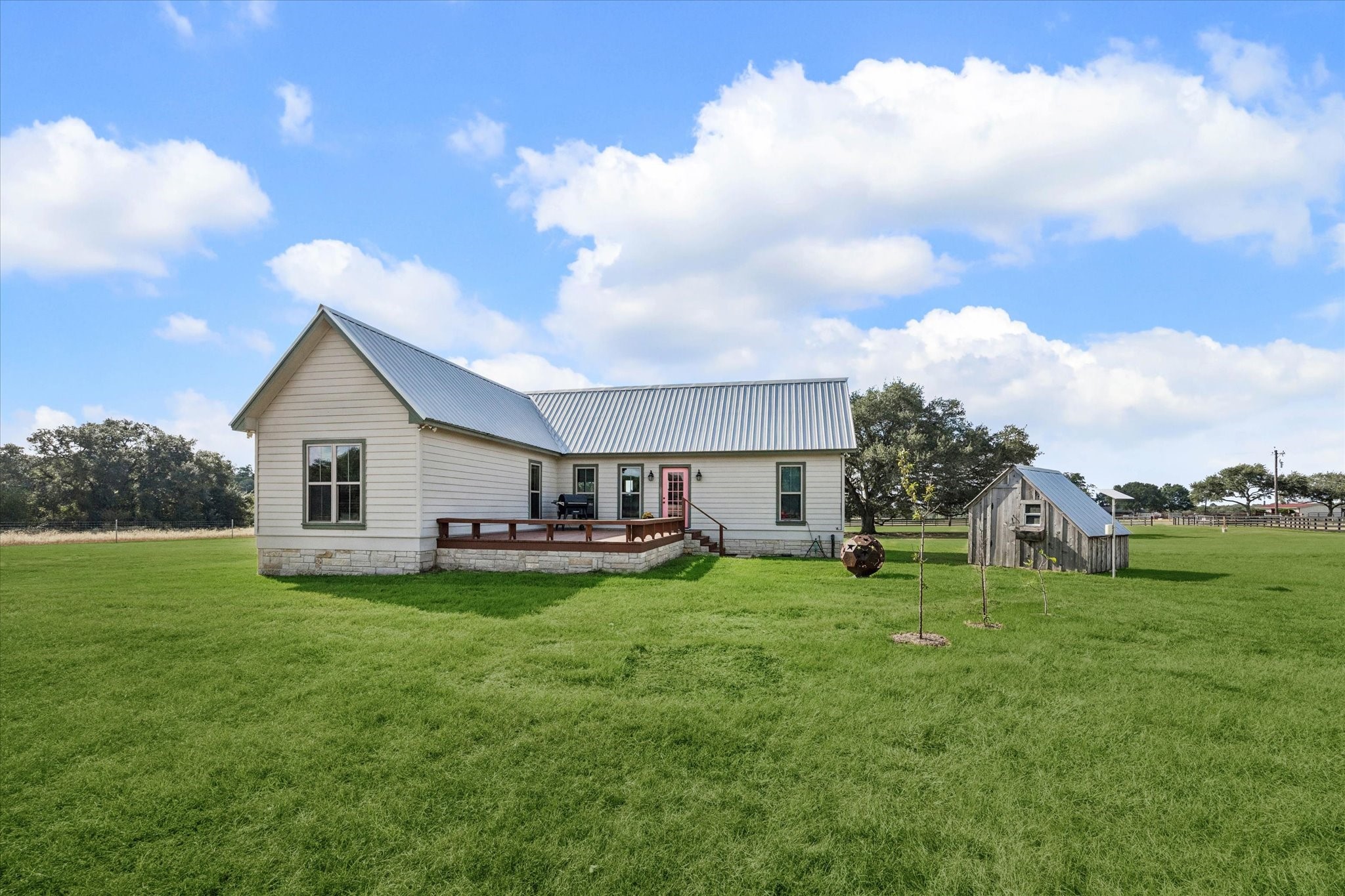 13792 Farm To Market Road 1094 Cat Spring, TX 78933 - Photo 18 of 25 a view of a house with a yard and sitting area