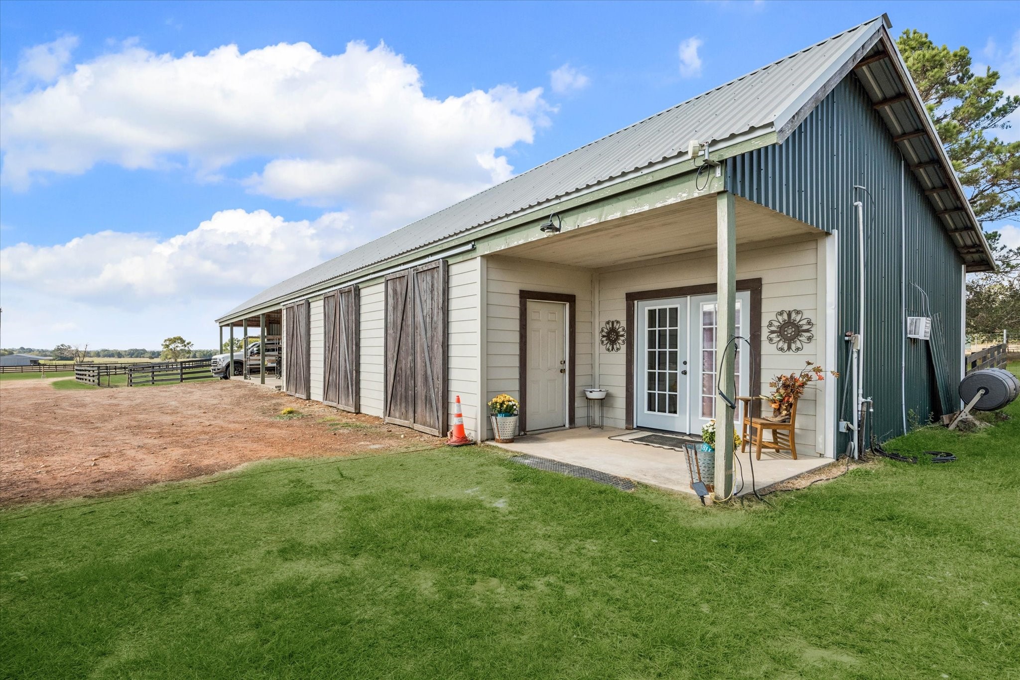 13792 Farm To Market Road 1094 Cat Spring, TX 78933 - Photo 19 of 25 a view of a house with backyard and porch