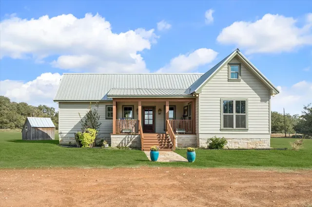 front view of a house with a yard