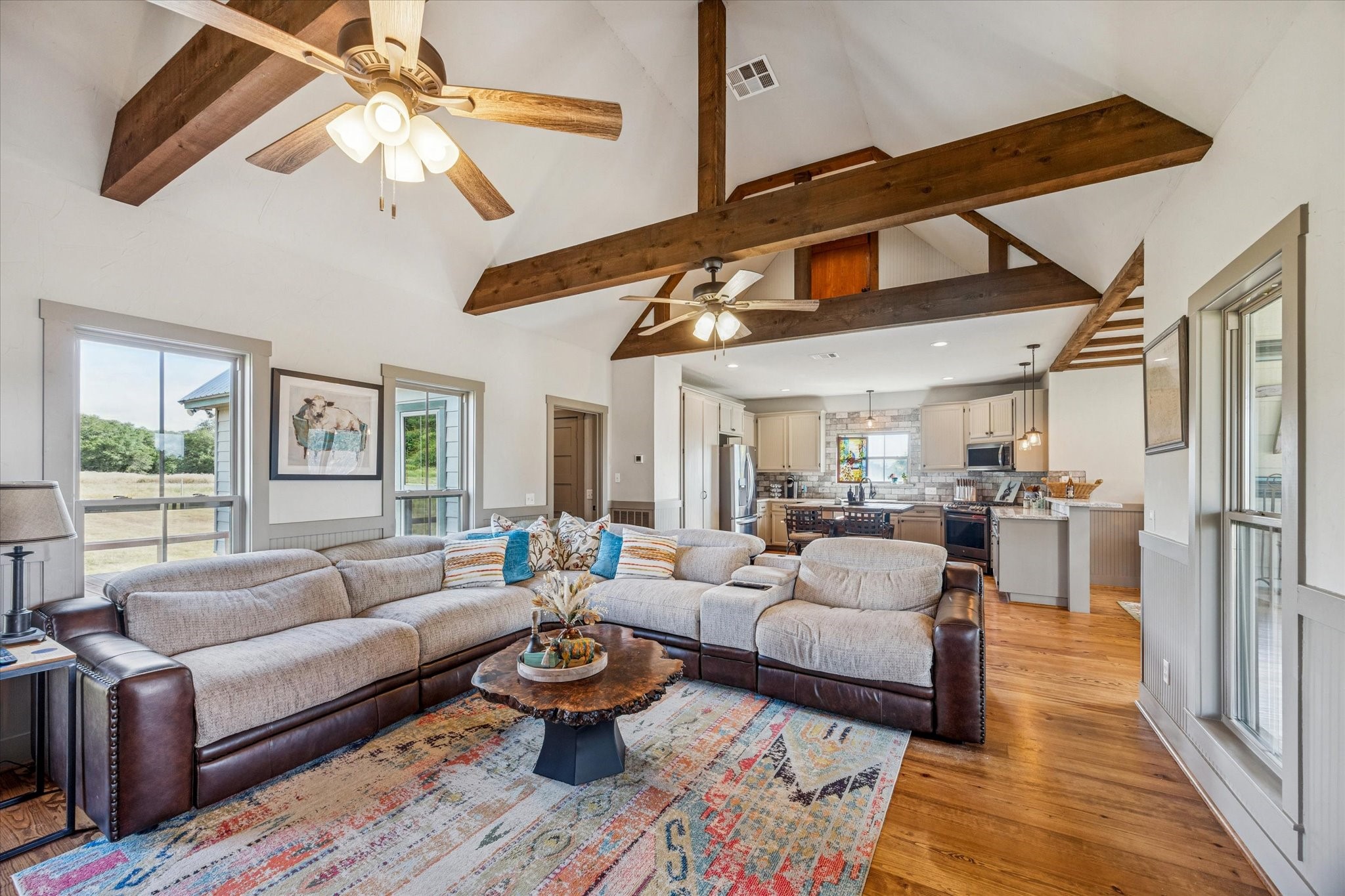 13792 Farm To Market Road 1094 Cat Spring, TX 78933 - Photo 8 of 25 a living room with furniture ceiling fan and a rug