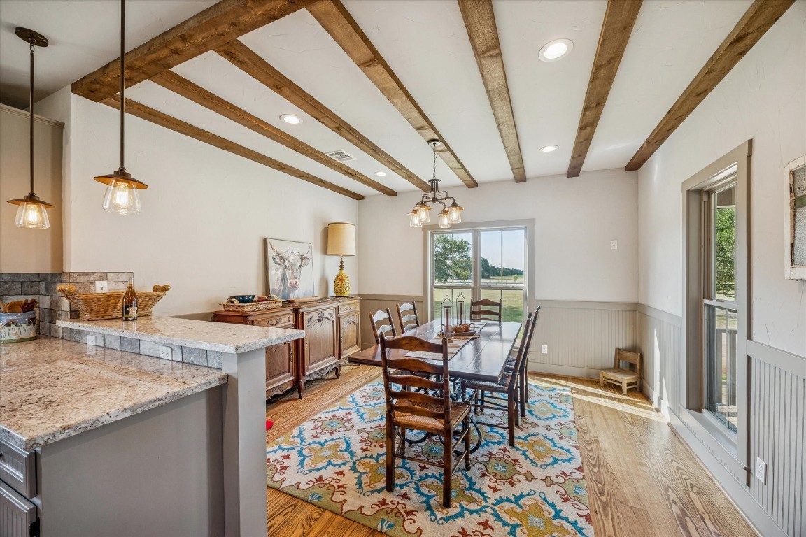 13792 Farm To Market Road 1094 Cat Spring, TX 78933 - Photo 10 of 25 a view of a dining room with furniture window and wooden floor