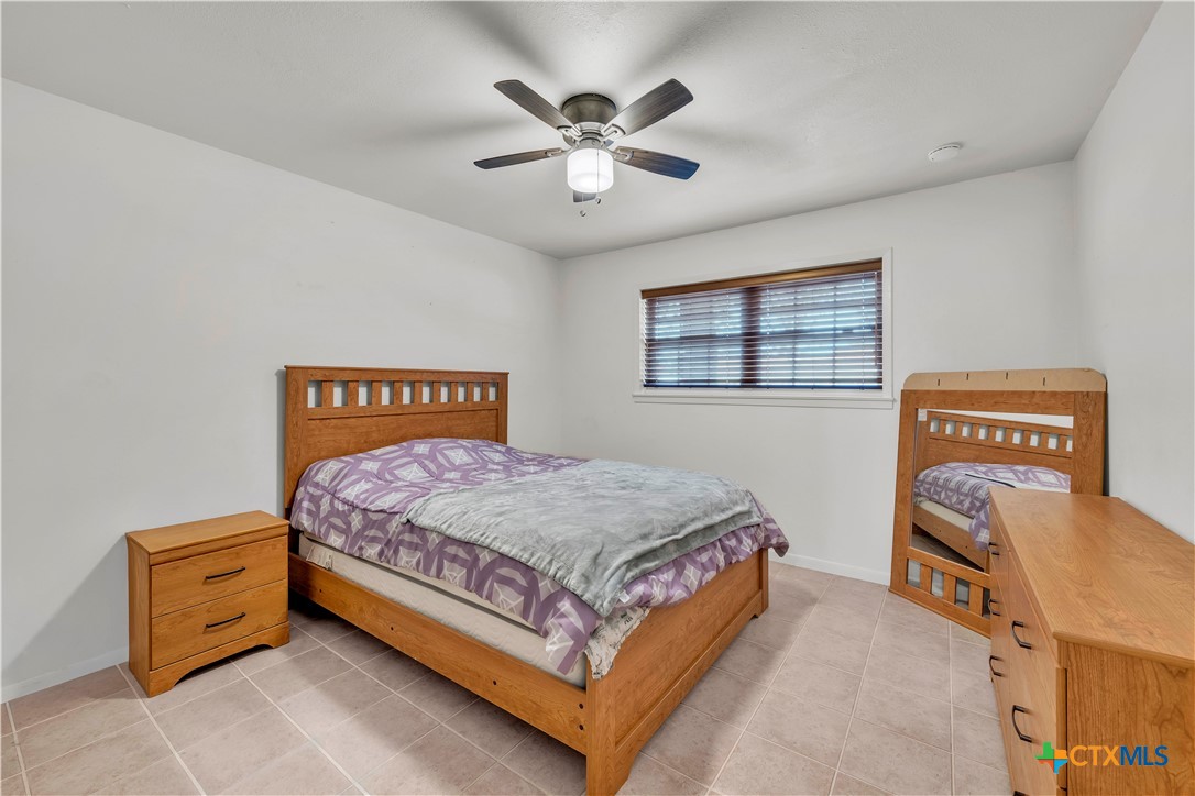313 Ruggles Loop Temple, TX 76501 - Photo 12 of 22 a bedroom with a bed and window