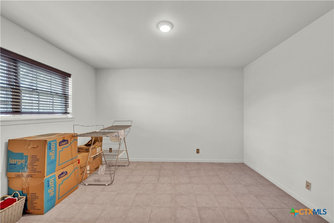 313 Ruggles Loop Temple, TX 76501 - Photo 22 of 22 an empty room with windows