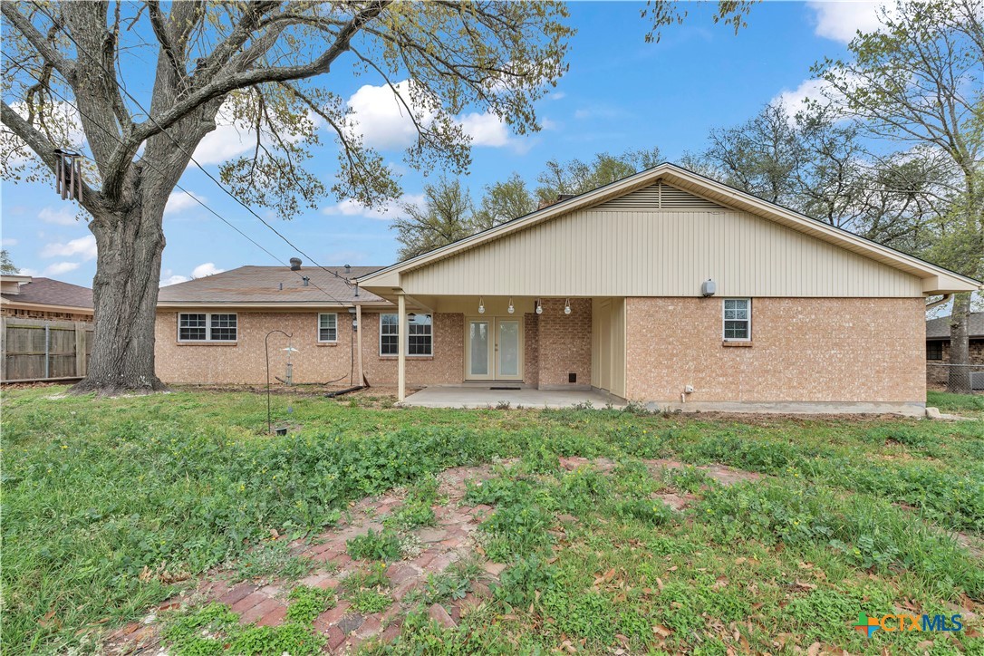 313 Ruggles Loop Temple, TX 76501 - Photo 5 of 22 a view of a yard in front of a house with large tree