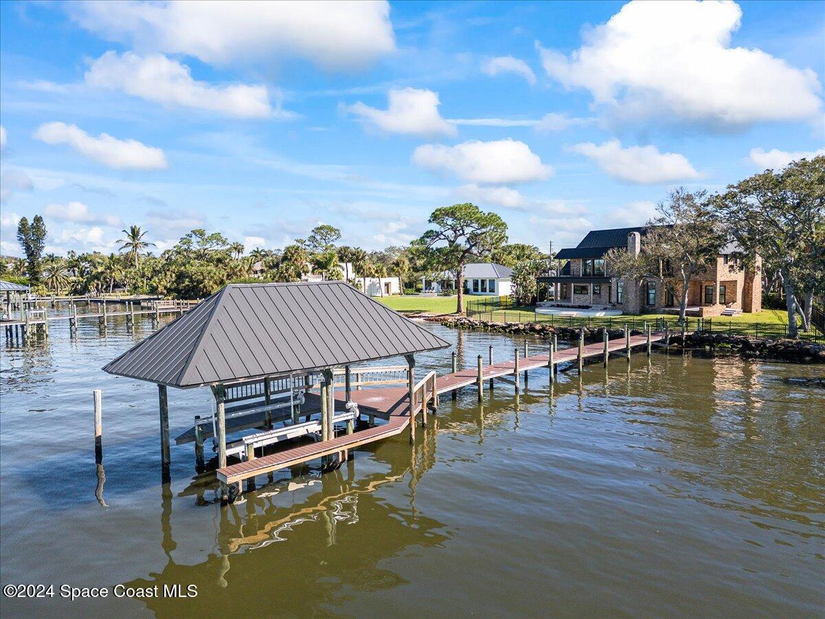 1316 South Riverside Drive Indialantic, FL 32903 - Photo 54 of 68 a view of a lake with house
