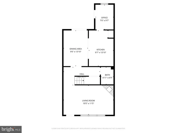 a picture of a bench in front of a wall