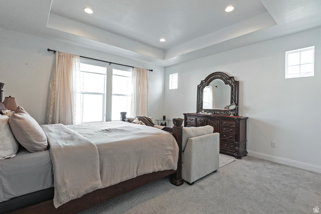 11694 Engelmann Drive Draper, UT 84020 - Photo 21 of 41 Carpeted bedroom with multiple windows, recessed lighting, and a raised ceiling