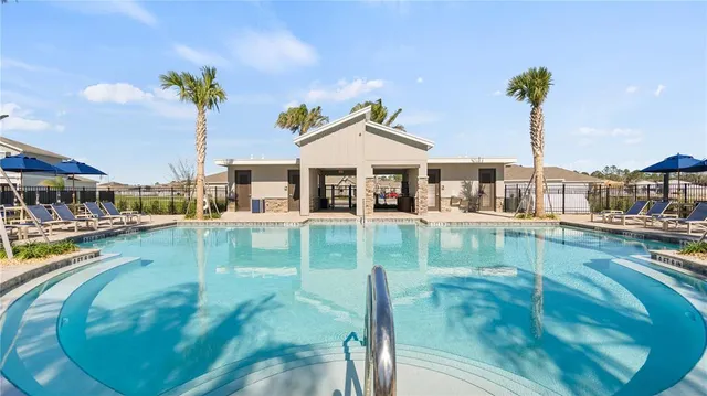 a view of a house with a swimming pool
