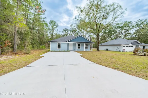 a house with trees in front of it