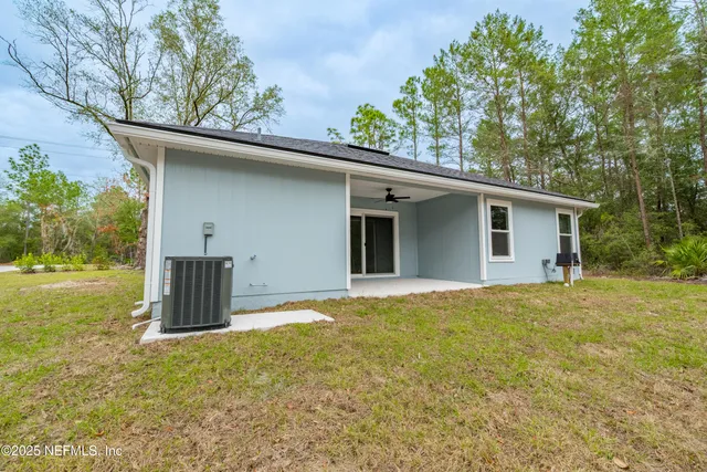 front view of house with a yard