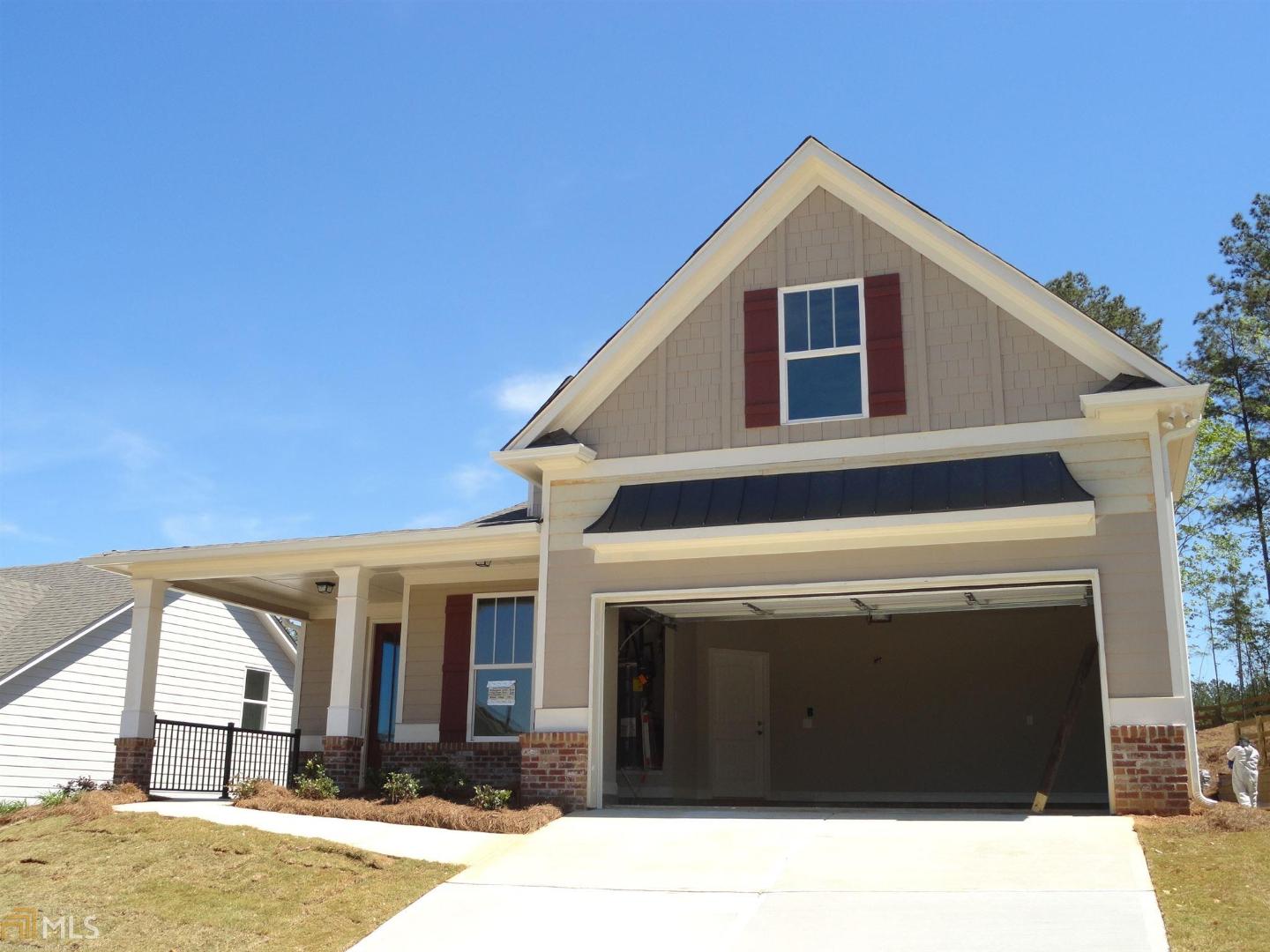 25 Azalea Crossing, Unit 1045 Dallas, GA 30132 - Photo 1 of 1 a front view of a house with a yard