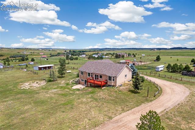 13775 Woodlake Road Elbert, CO 80106 - Photo 35 of 44 Aerial view of sparsely populated area with agricultural land