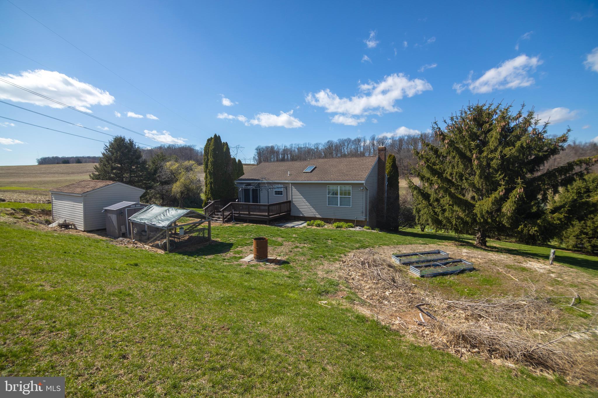 185 Elfner Road Red Lion, PA 17356 - Photo 14 of 34 a view of a house with backyard and porch