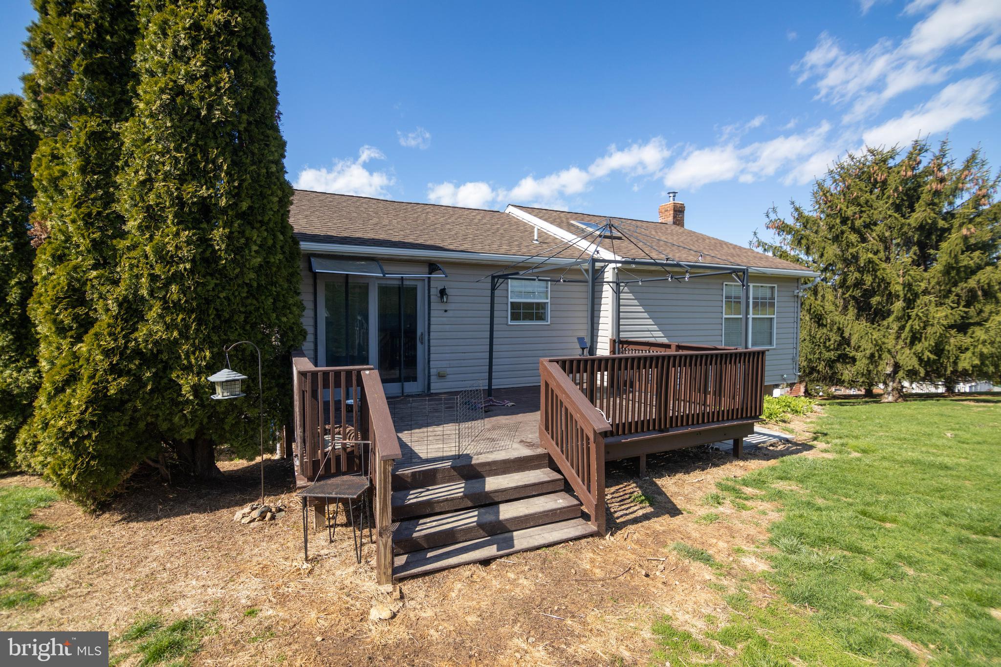 185 Elfner Road Red Lion, PA 17356 - Photo 15 of 34 a view of a house with backyard and sitting area