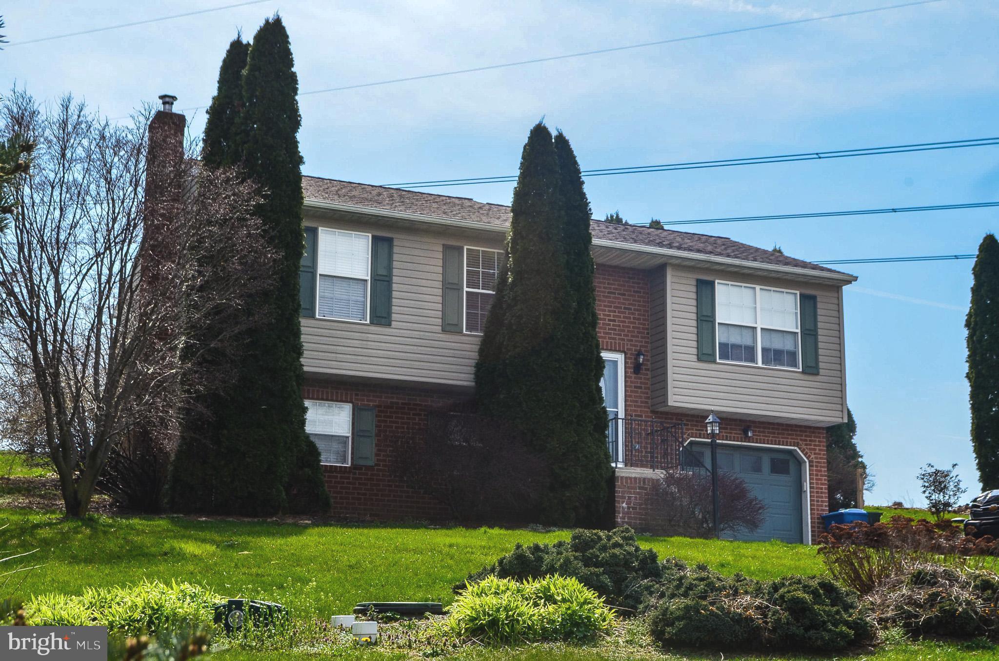 185 Elfner Road Red Lion, PA 17356 - Photo 30 of 34 a front view of a house with garden