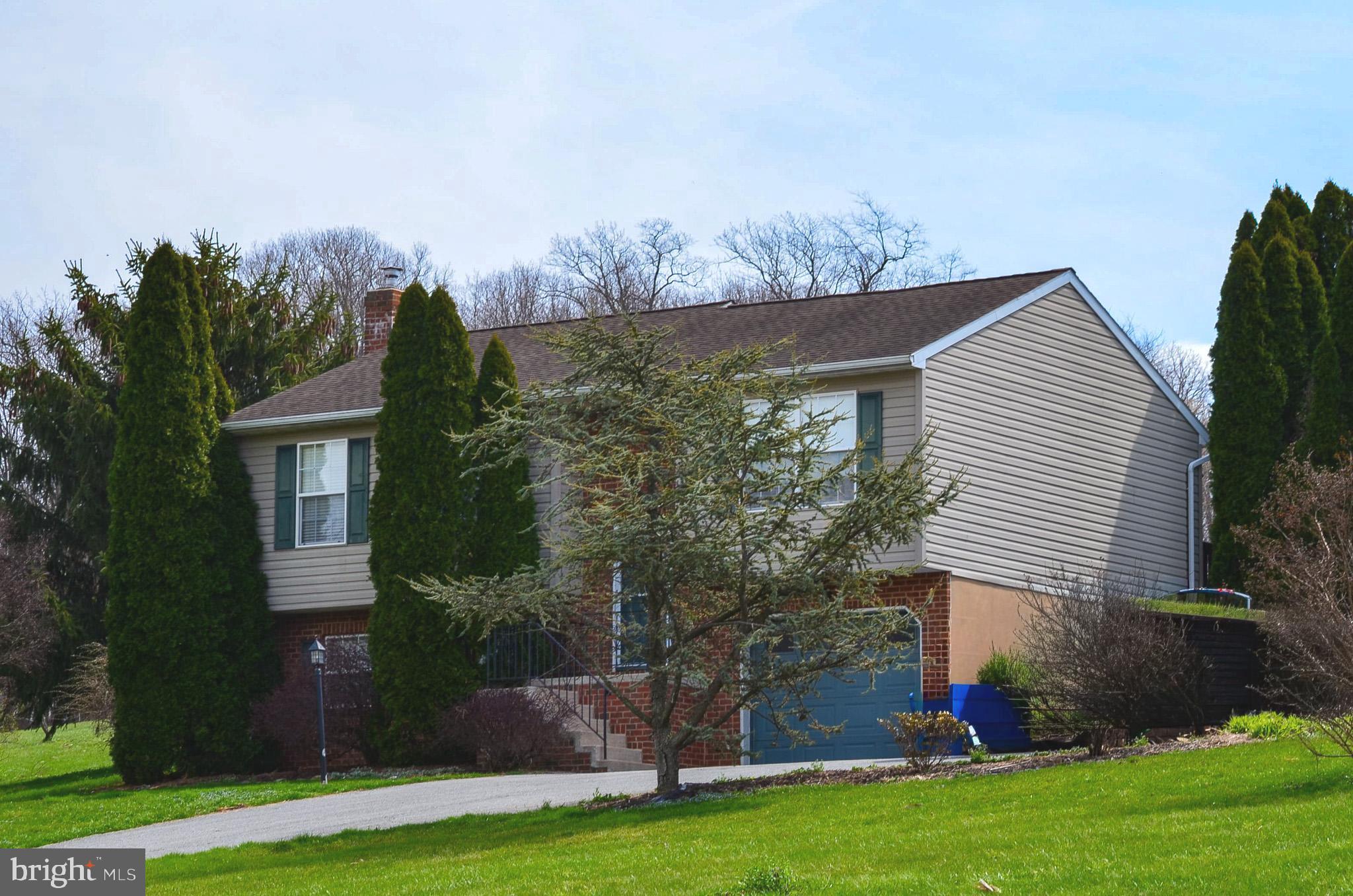 185 Elfner Road Red Lion, PA 17356 - Photo 32 of 34 front view of a house with a yard