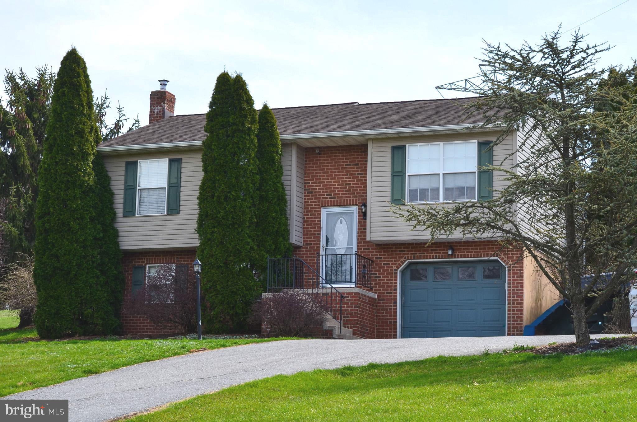 185 Elfner Road Red Lion, PA 17356 - Photo 4 of 34 a front view of a house with garden