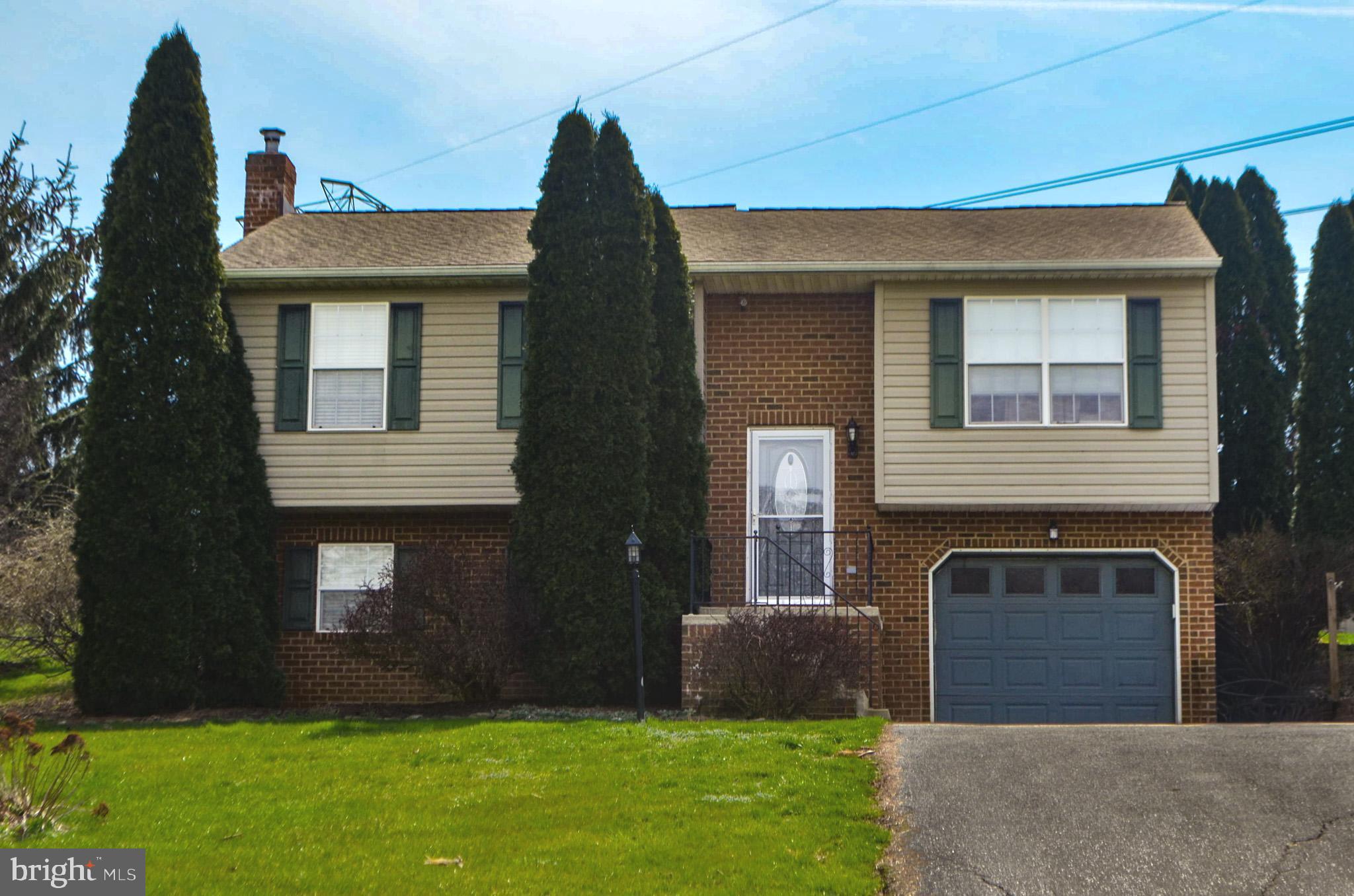 185 Elfner Road Red Lion, PA 17356 - Photo 8 of 34 a front view of a house with garden