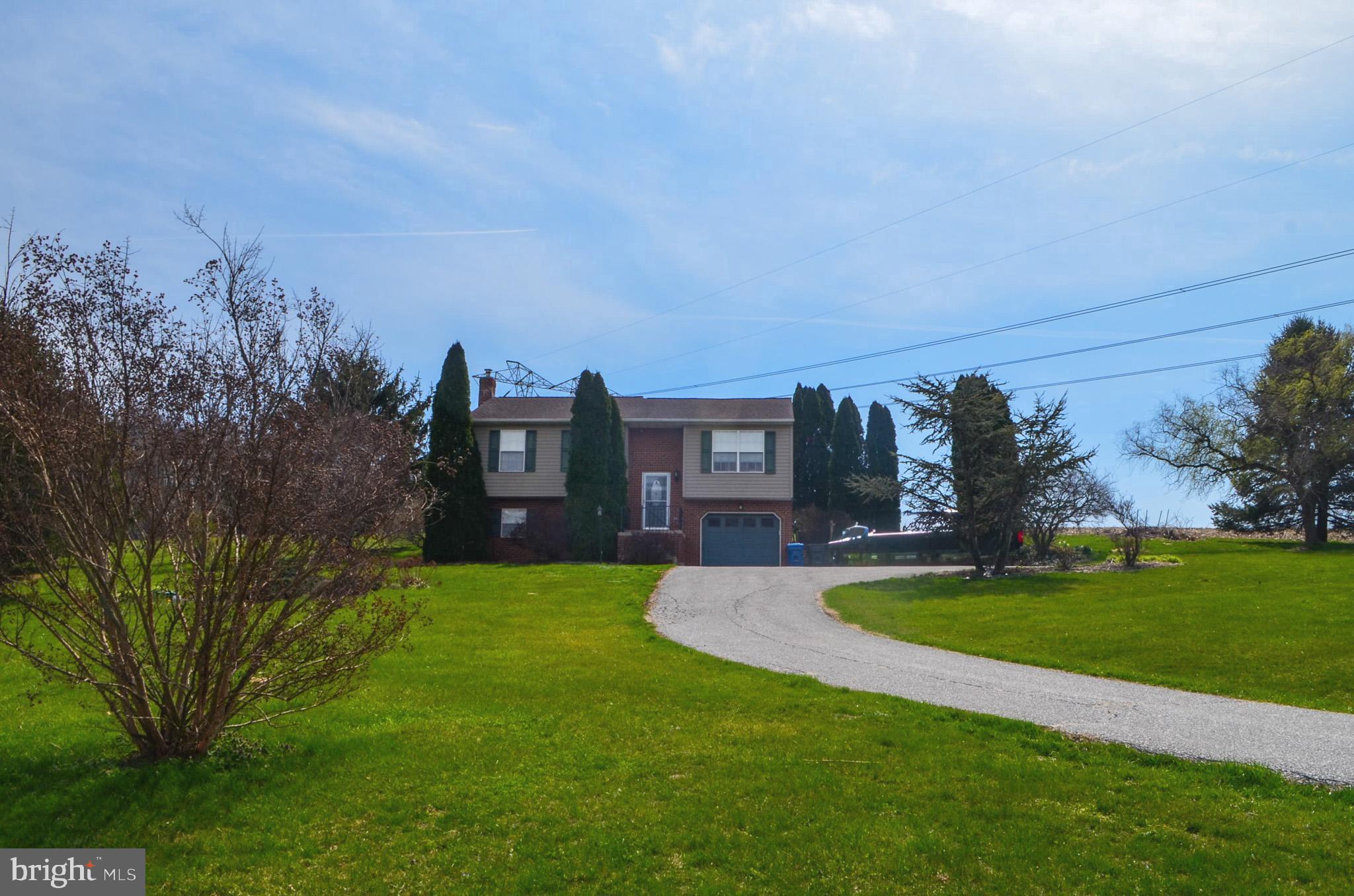 185 Elfner Road Red Lion, PA 17356 - Photo 10 of 34 a view of a backyard with green space