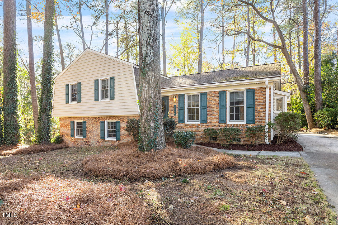 3924 Willow Oak Road Raleigh, NC 27604 - Photo 2 of 10 a front view of a house with a yard