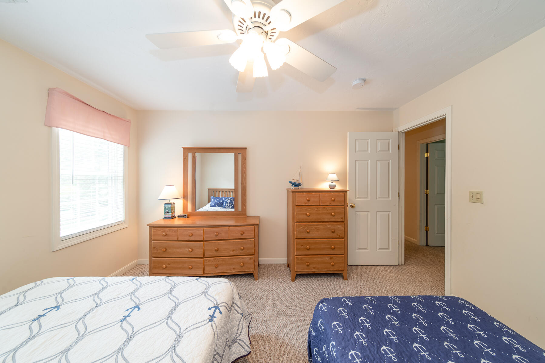 15 Nehoiden Road Mashpee, MA 02649 - Photo 15 of 40 a bedroom with a bed and a dresser