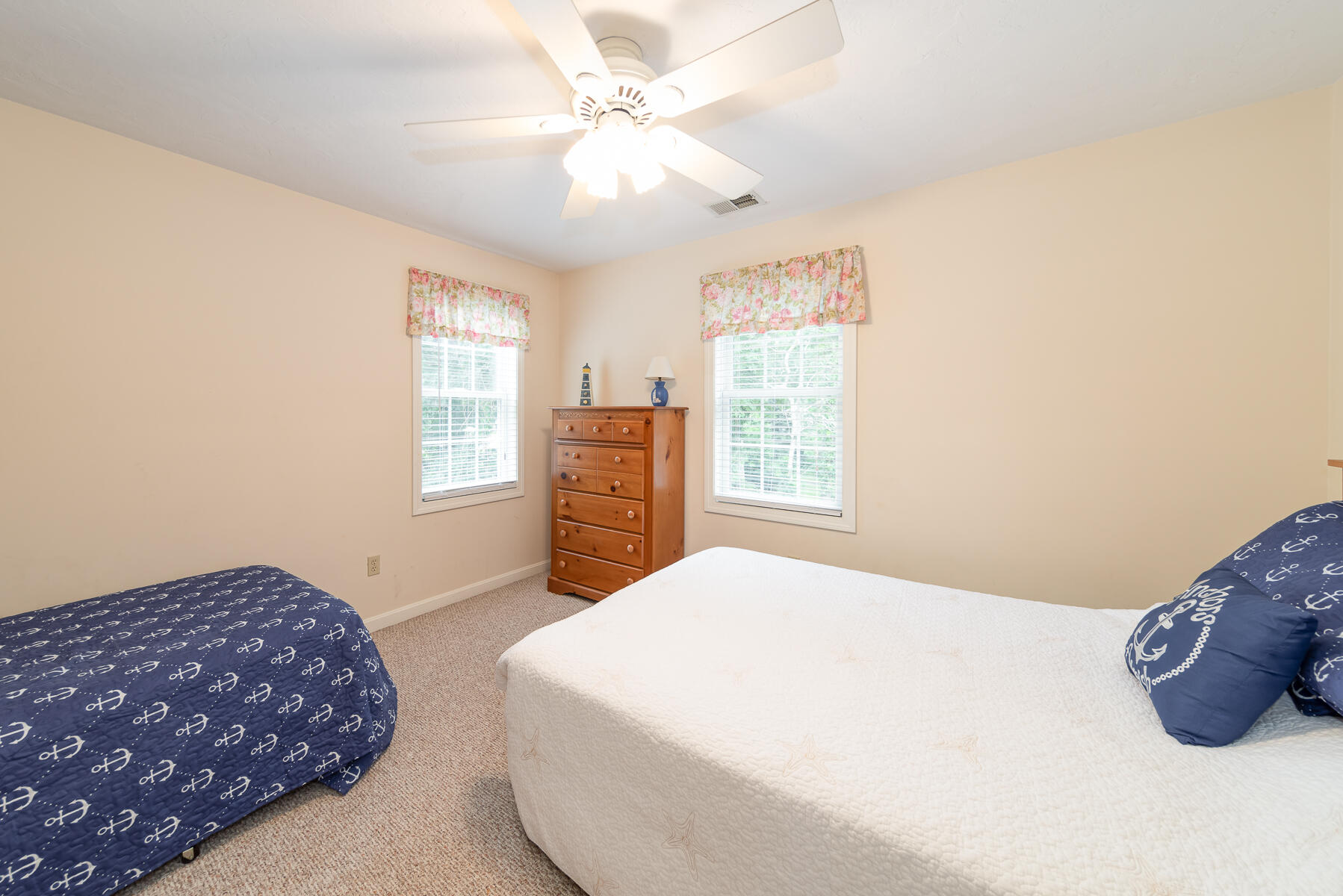 15 Nehoiden Road Mashpee, MA 02649 - Photo 19 of 40 a bedroom with a bed and a window