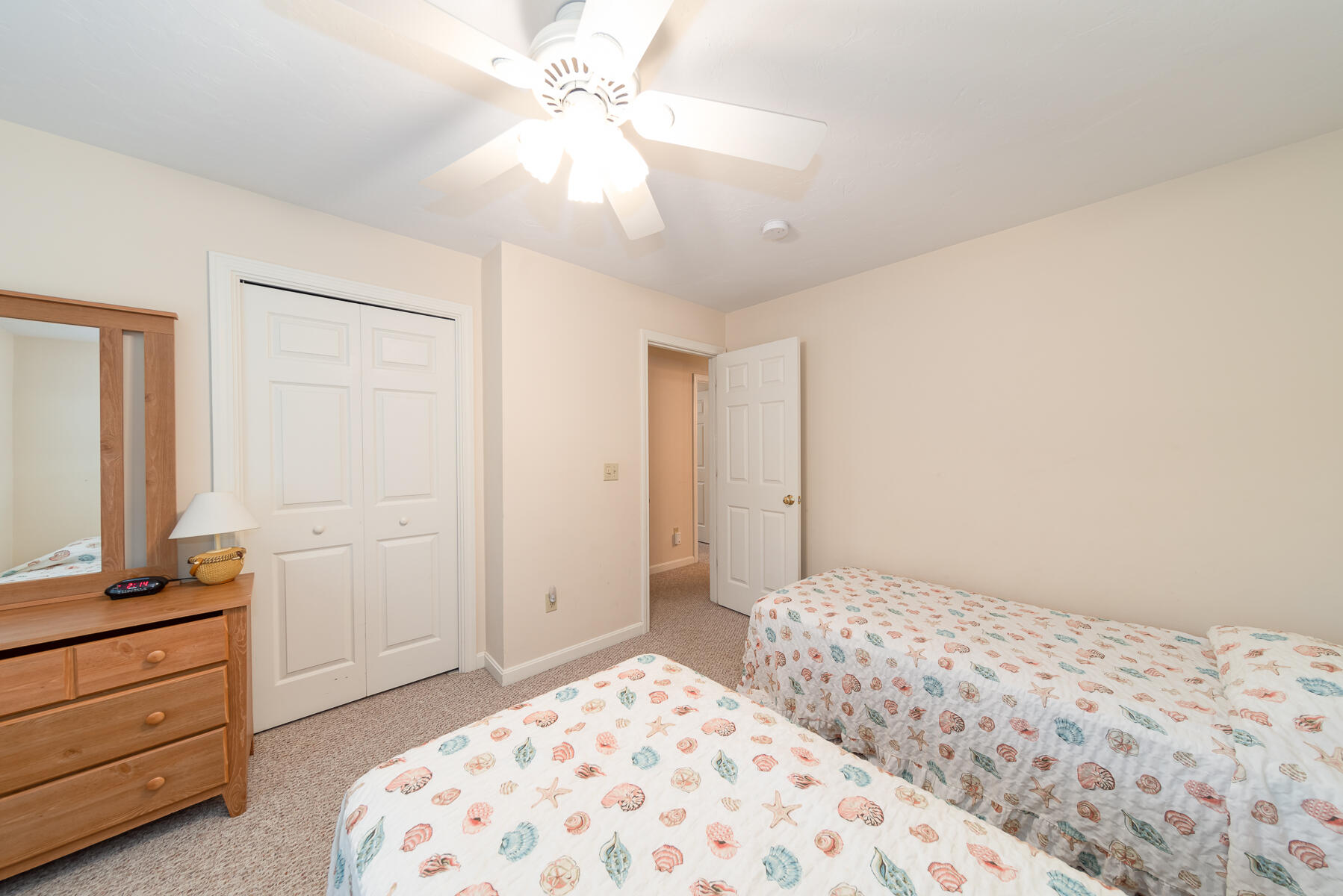 15 Nehoiden Road Mashpee, MA 02649 - Photo 20 of 40 a bedroom with a bed and a dresser in it