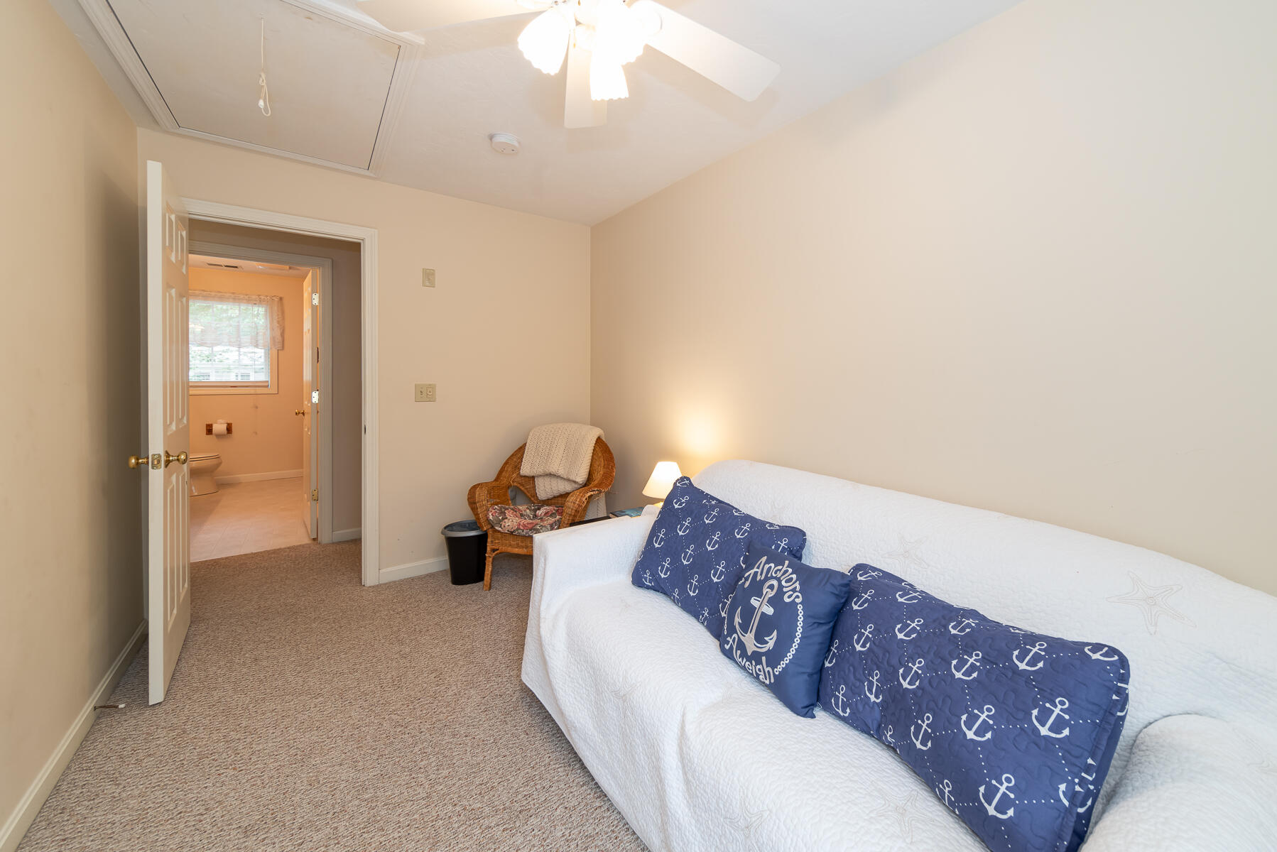 15 Nehoiden Road Mashpee, MA 02649 - Photo 22 of 40 a living room with furniture and a chandelier