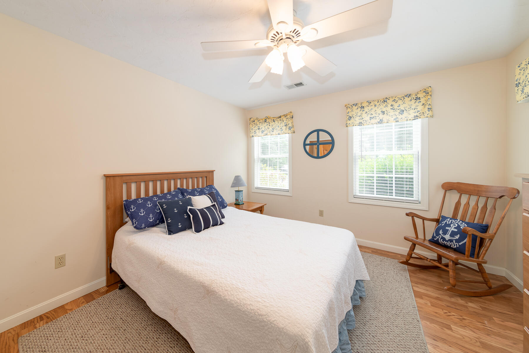 15 Nehoiden Road Mashpee, MA 02649 - Photo 29 of 40 a bedroom with a bed and chair