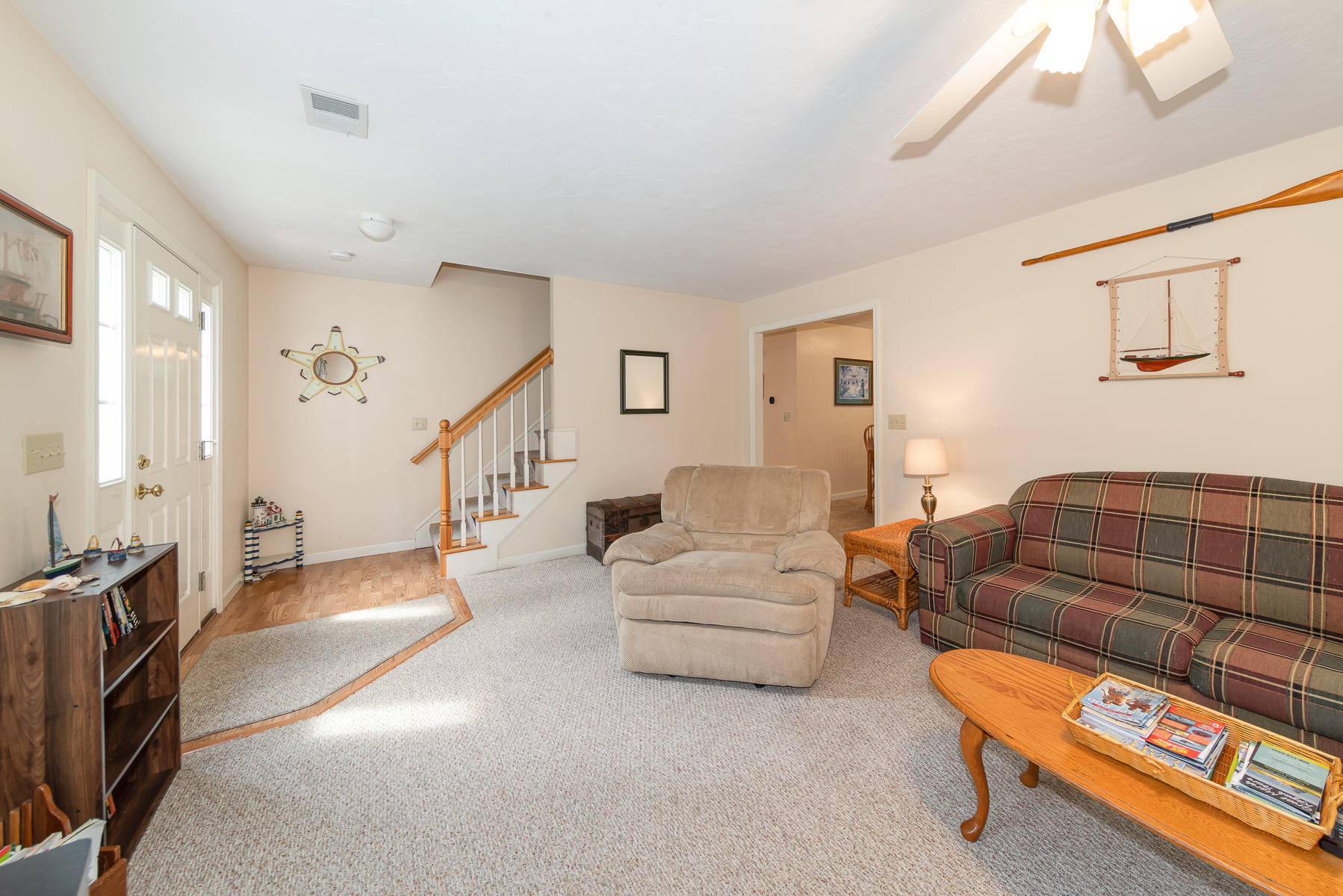 15 Nehoiden Road Mashpee, MA 02649 - Photo 4 of 40 a living room with furniture and a dining table