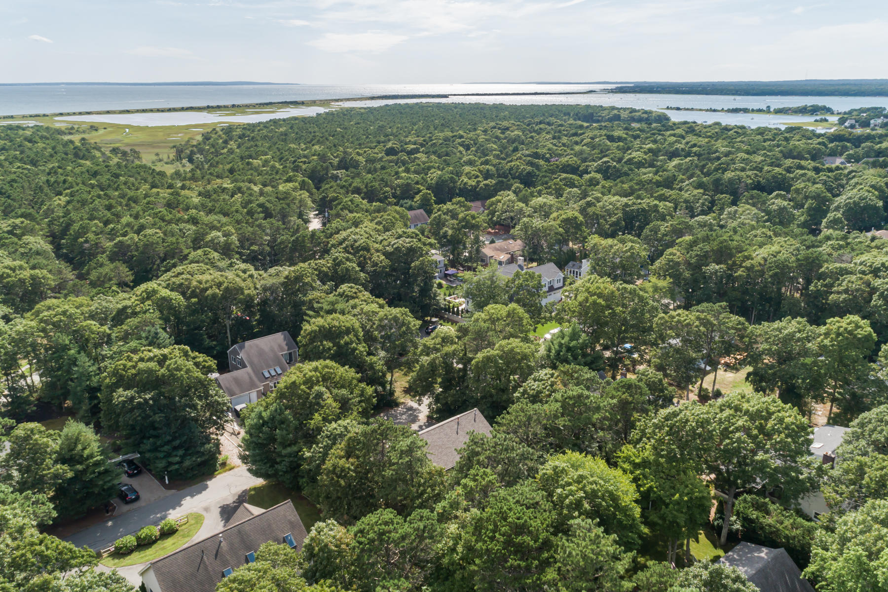 15 Nehoiden Road Mashpee, MA 02649 - Photo 6 of 40 an aerial view of residential houses with outdoor space and trees