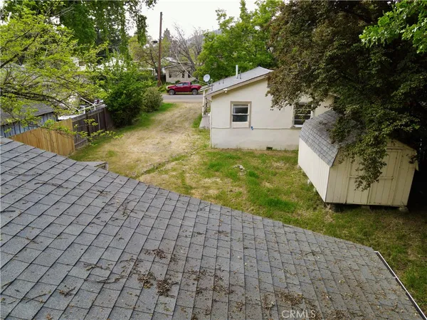 a backyard of a house with lots of green space