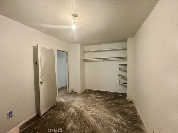 a view of a backyard of the house