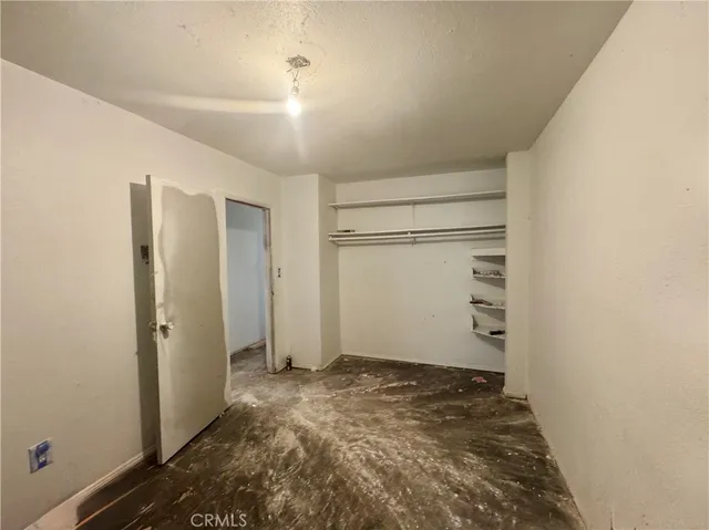 a view of a backyard of the house