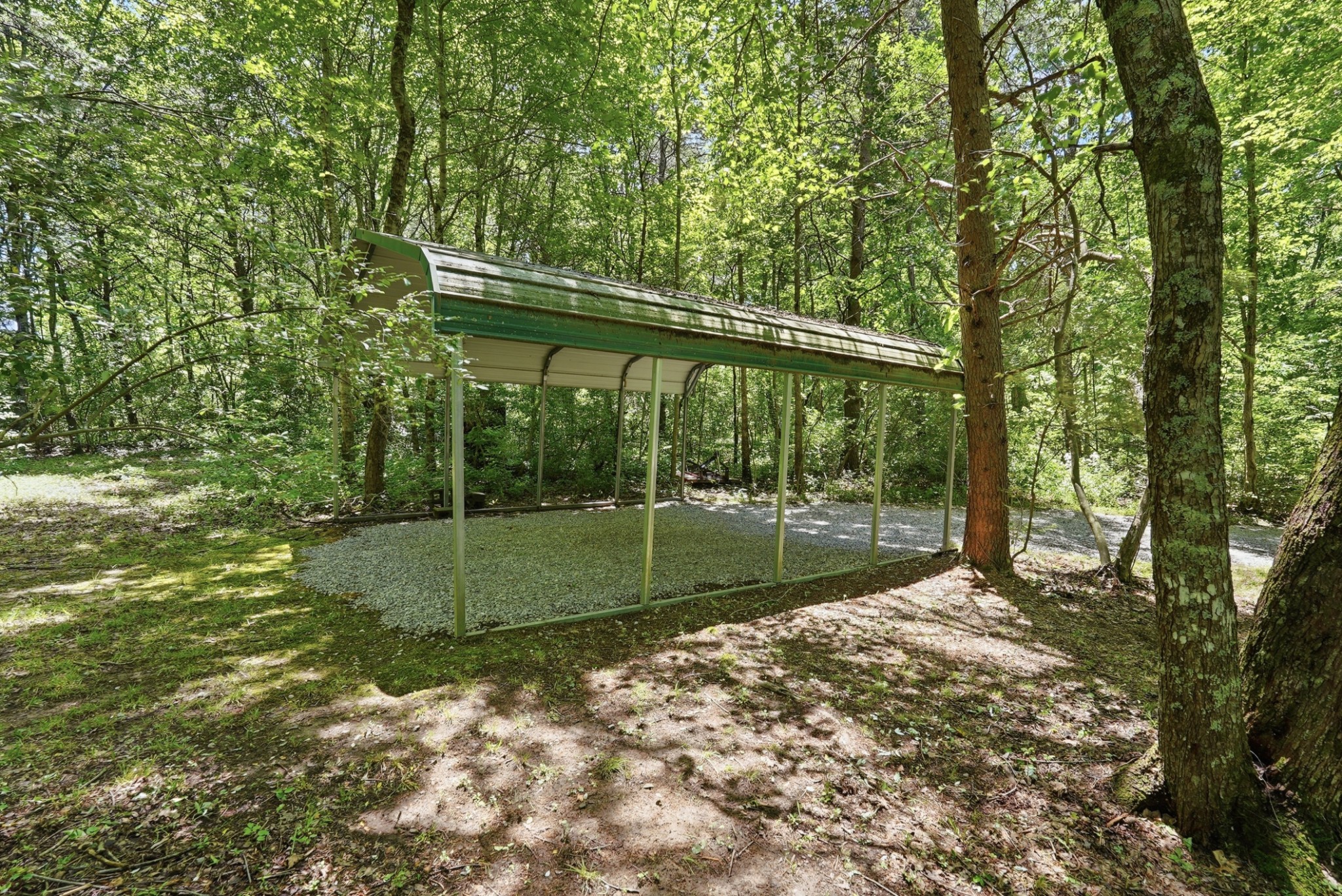 118 Cherokee Road Spencer, TN 38585 - Photo 38 of 85 a backyard of a house with lots of green space