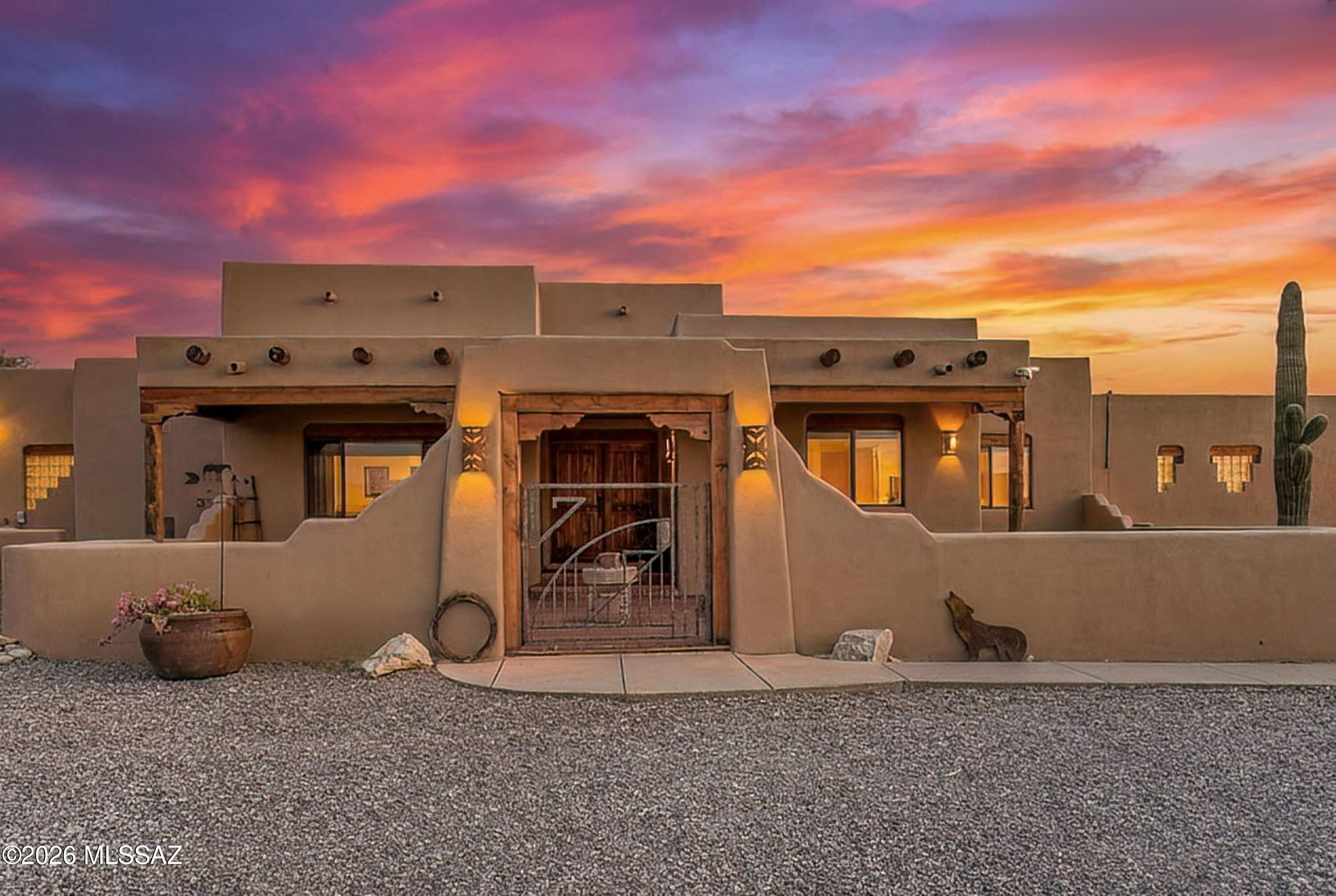 Lovely gated courtyard with a fountain, covered patio boasting unobscured views of the Catalina’s.
Public (Primary)