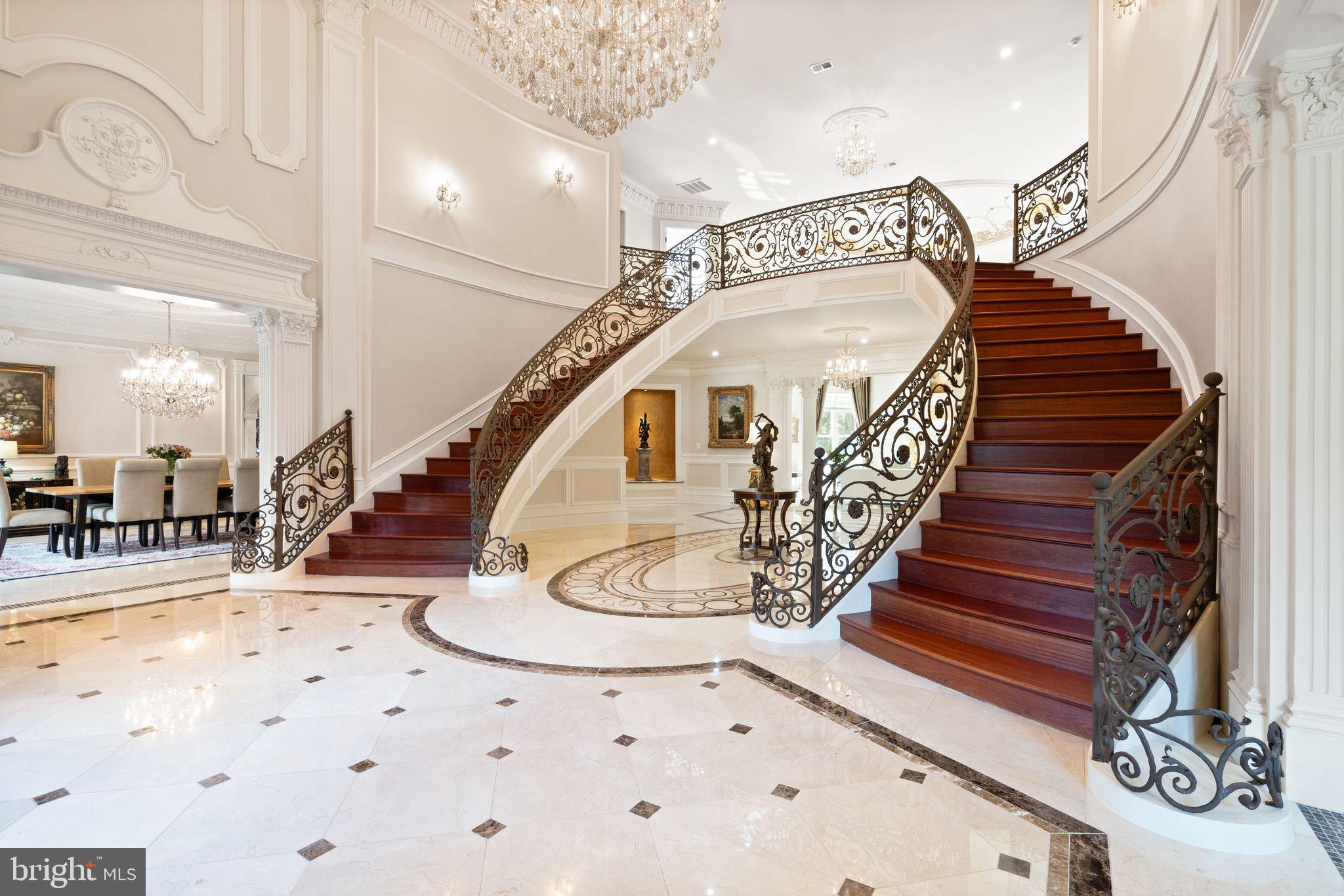 938 Peacock Station Road McLean, VA 22102 - Photo 5 of 50 Grand Foyer Framed by Elegant Dual Staircase