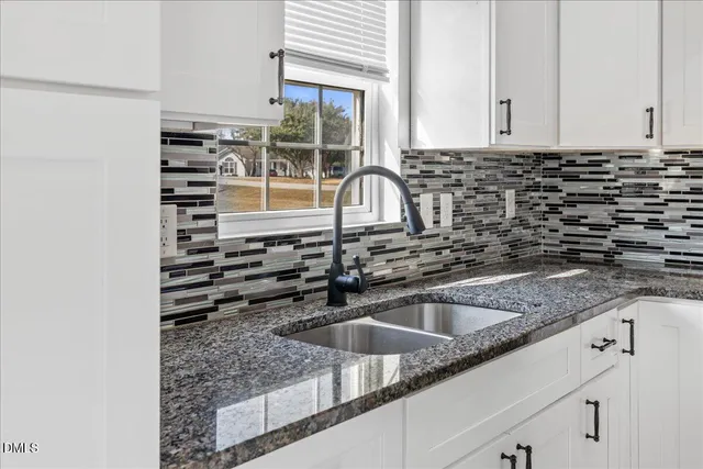 a view of a hallway with closet