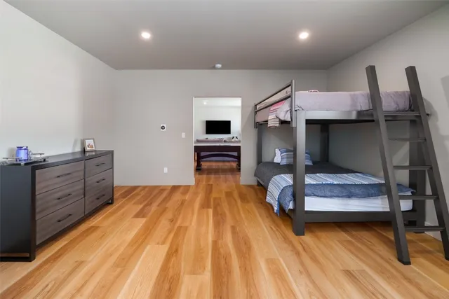 a bedroom with a bed and furniture