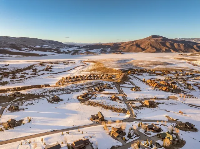 an aerial view of residential building and ocean