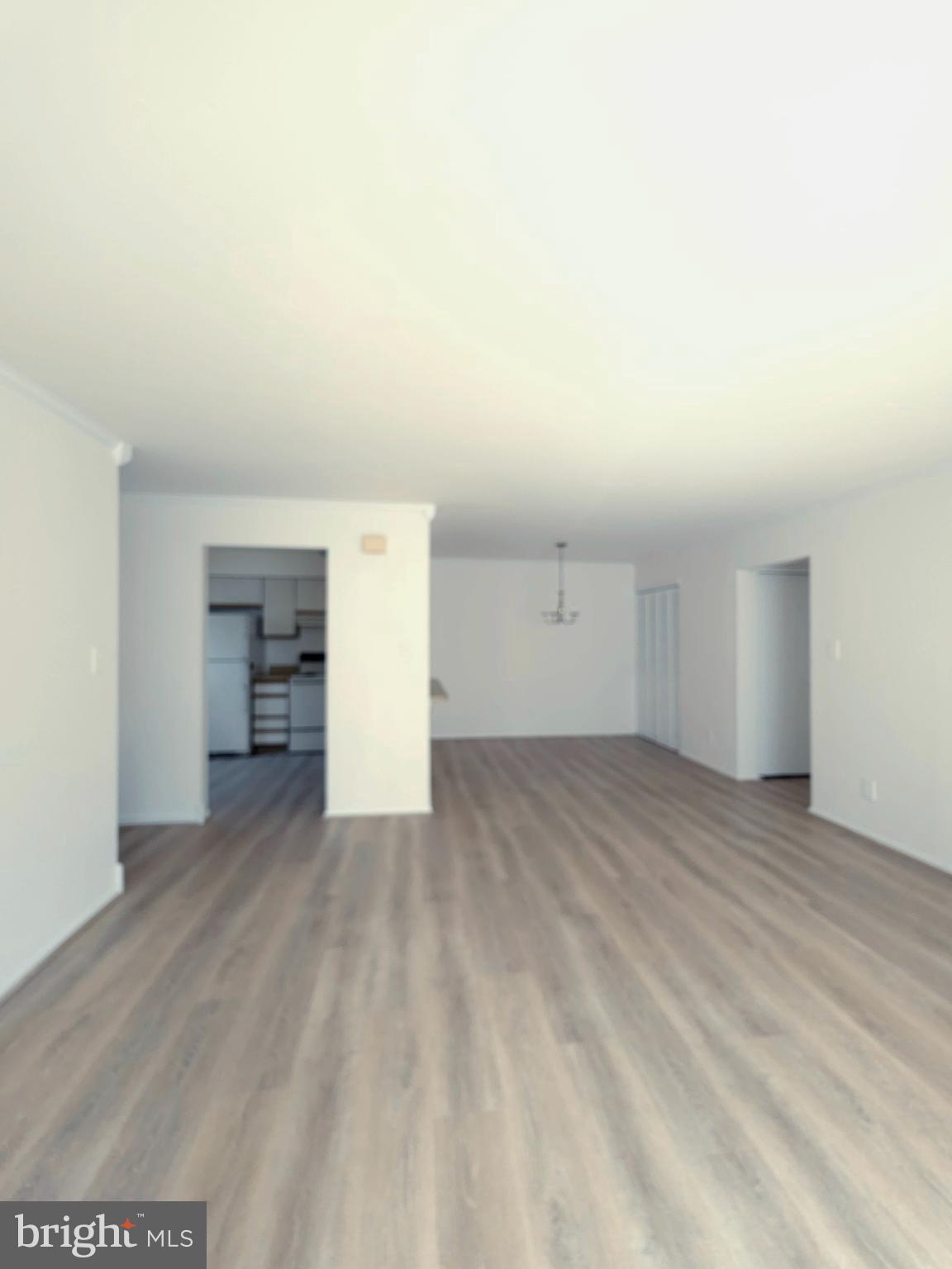 336 A Delancey Place, Unit 336A Mount Laurel, NJ 08054 - Photo 15 of 18 a view of empty room with wooden floor