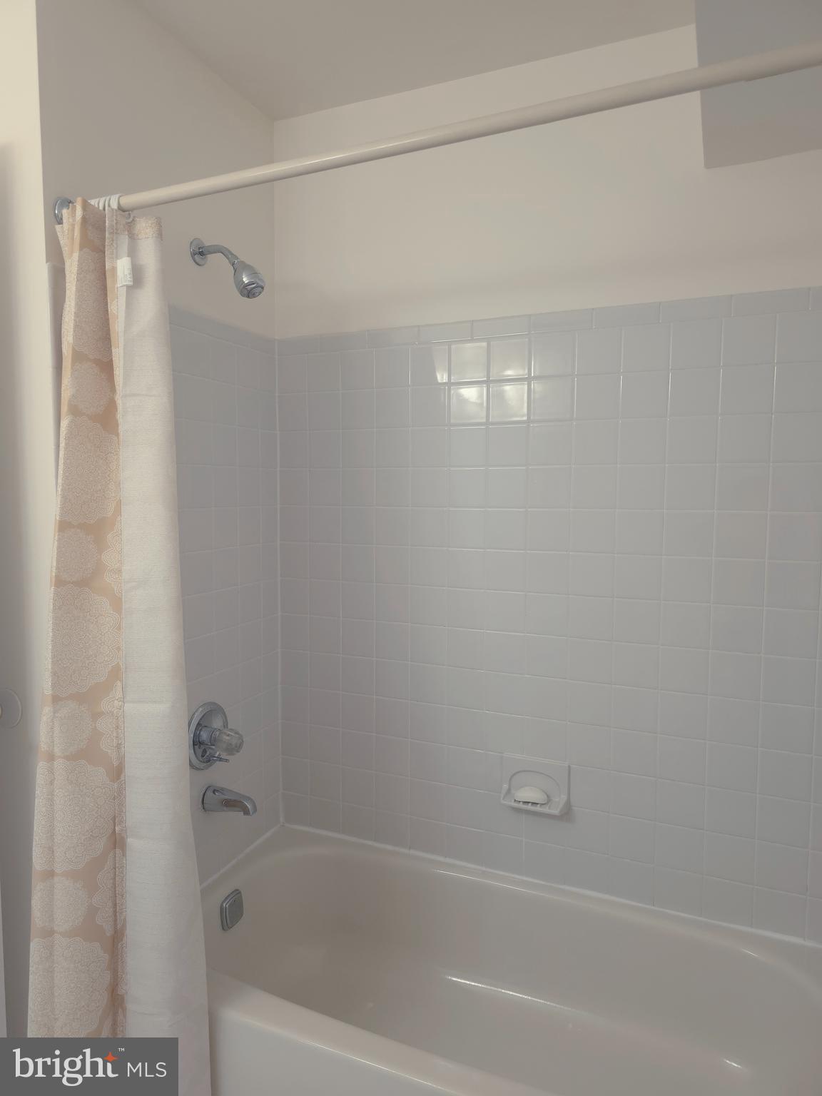 336 A Delancey Place, Unit 336A Mount Laurel, NJ 08054 - Photo 10 of 18 a bathroom with a shower and a bath tub