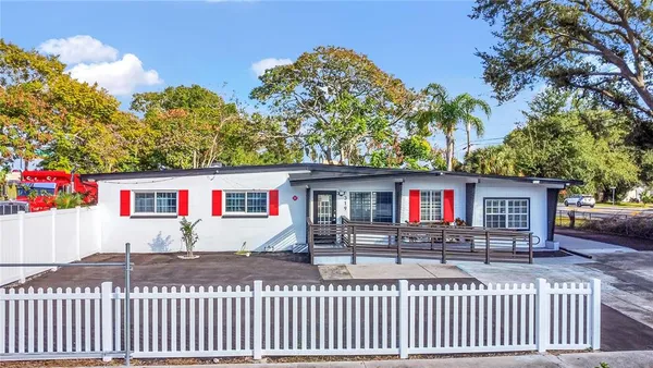 a front view of a house with yard