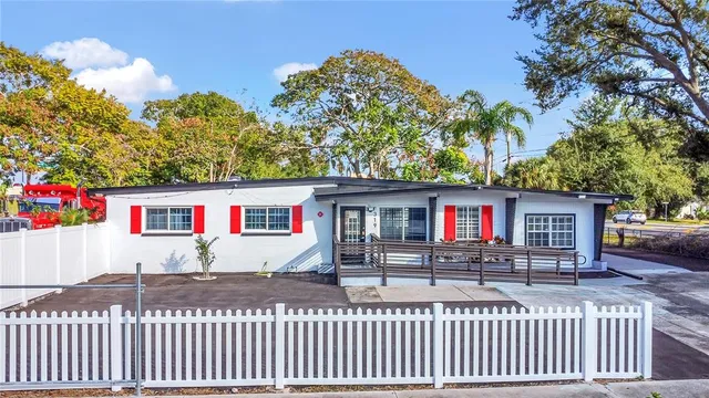 a front view of a house with yard