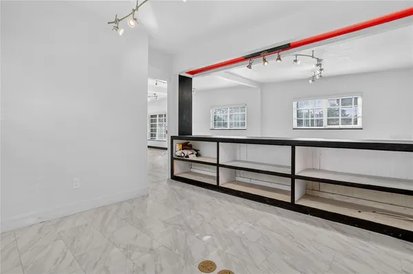 an empty room with windows