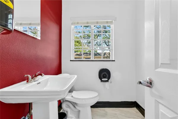 an aerial view of a house with swimming pool