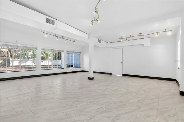 a view of a yard with an outdoor space